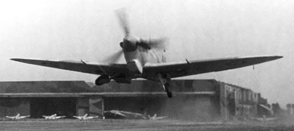 Alex getting airborne from the apron on another test flight from Castle Bromwich in a Spitfire Vb fitted with a Vokes tropical filter.